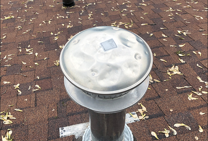 Hail Damage On HVAC Pipe Cap